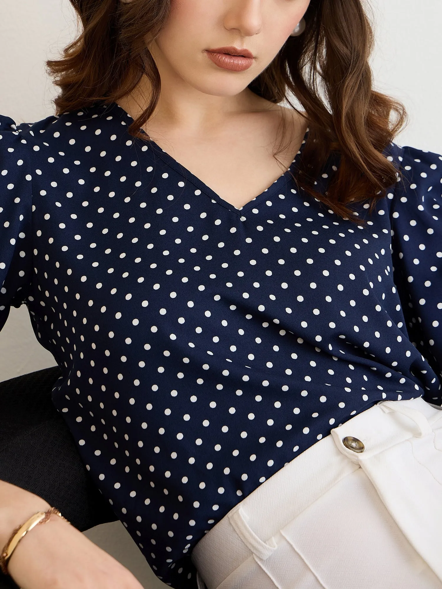 Berrylush BIZwear Women Navy Blue & White Polka Dot Printed V-Neck Puff Sleeves Regular Top